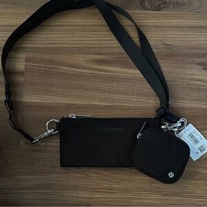Lululemon black dual pouch sling